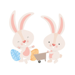 Fototapeta premium bunnies with wheelbarrow and easter eggs icon