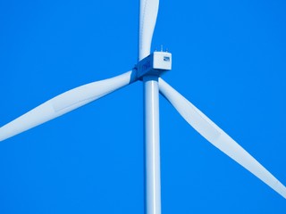 Wind turbine with three blades.