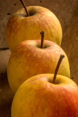 Apples on wooden background
