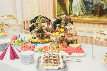 Different kinds of baked sweets on a buffet