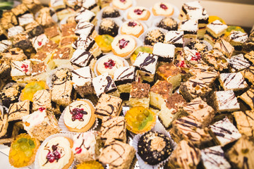 Different kinds of baked sweets on a buffet