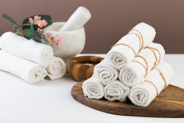 Spa still life with aromatic candles, flower and towel. - Image.
