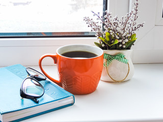 Coffee mug with letter and glasses on teal rustic table,cozy breakfast, vintage style. Breakfast coffee.cozy breakfast, vintage style. Office workers having a coffee break. top view. Having a break.