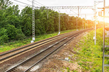 Fototapeta na wymiar Electrified empty railway with two ways. View of the turn