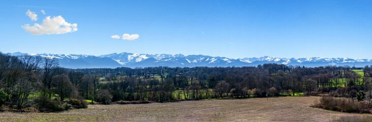 view of the countryside with the Pyrenees mountains in background