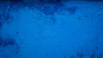  abstract blue surface of the wall / background with irregularities and stains of different colors