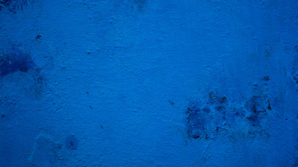  abstract blue surface of the wall / background with irregularities and stains of different colors