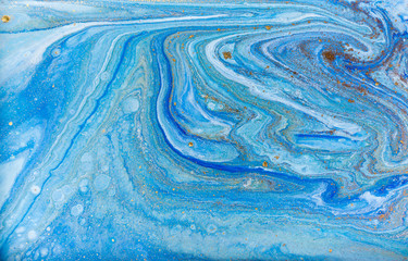Blue and gold marbling pattern. Golden marble liquid texture.