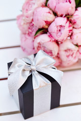 Gift box with flower bouquet 