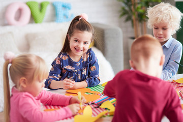 Happy kids with handmade decoration for Easter