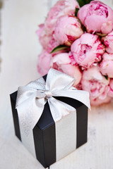 Gift box with flower bouquet 