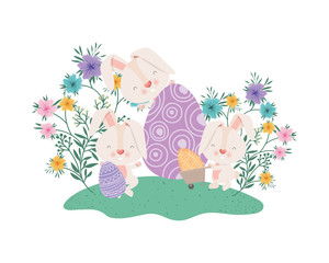 easter rabbits with eggs and flowers icon