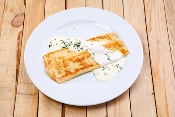stuffed pancakes with sour cream