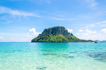 A Thai long tail boat on the beach of Andaman sea located at Krabi near Phuket, Thailand