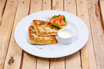stuffed pancake with cheese and salmon