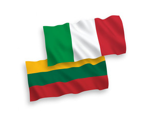 National vector fabric wave flags of Italy and Lithuania isolated on white background. 1 to 2 proportion.