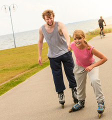 roller skater couple skating outdoor