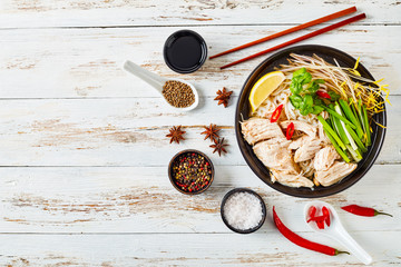 soup Pho Ga with chicken breast, flatlay