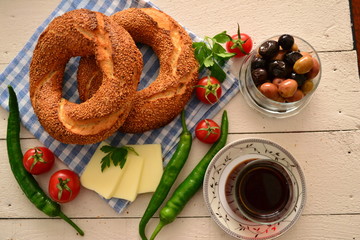 breakfast with bagels and tea, olives