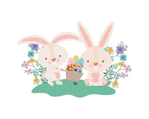 rabbits with wheelbarrow and easter eggs icon
