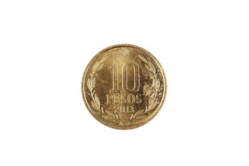 A macro image of a gold Chilean ten peso coin isolated on a white background