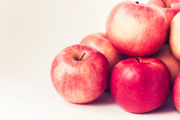 Fresh ripe red apples on white background, vegetarian concept.