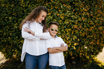 Naklejka premium Mother and son together park