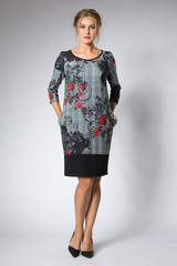 Fashion young girl posing in white / Gray dress