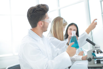 male researcher carrying out scientific research in a lab