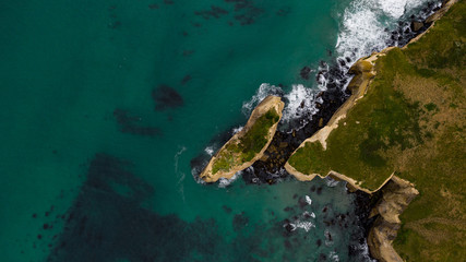 aerial photography of tunnel beach in New Zealand, DUNEDIN, NEW ZEALAND Tunnel beach, Dunedin, South island of New Zealand, amazing coast line from above with a drone, Cliff formations at Tunnel Beach