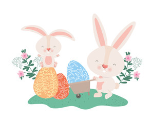 rabbits with wheelbarrow and easter eggs icon