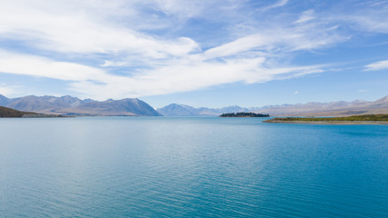 Lake tekapo from the air, aerial shot of the beautiful lake tekapro in New Zealand, stunning blue water lake in New Zealand, aerial photography of amazing nature, nature photography with a drone,