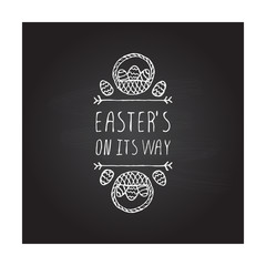 Hand drawn typographic easter element on chalkboard background
