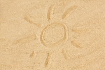 Fototapeta na wymiar summer vacation concept - picture of sun in sand on beach
