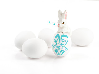 Happy Easter lettering on egg and wood rabbit on white background, Easter design with cute bunny and text, hand drawn illustration