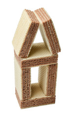 A waffle house like in a fairytale sweet city on a white isolated background. Side view from above.