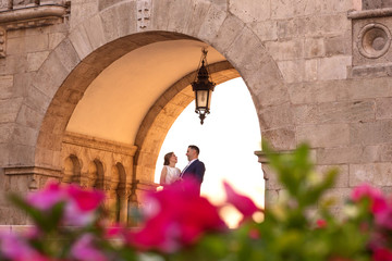 In love wedding couple posing in castle