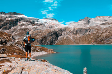 Man hiking around the weißsee, at the hohe tauern national park in austria