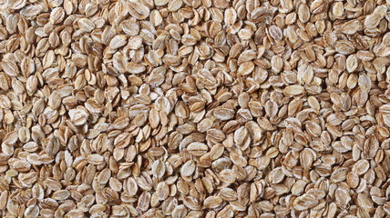 Crunchy rye grain cereal for breakfast background and texture