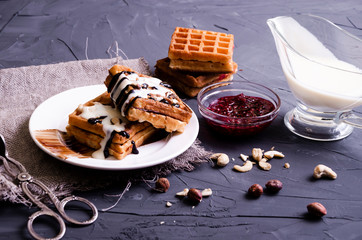 Viennese waffles with chocolate and cream topping