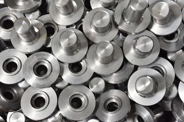 Iron component group at valve manufacturing plant. Retractable valve inside the faucet