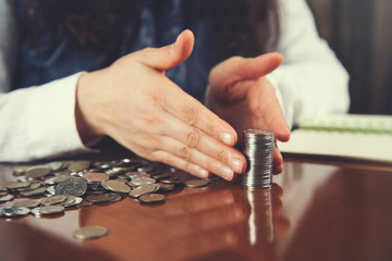 woman hand coins