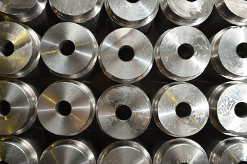 The texture of the round parts with a hole in the center at the plant for the production of valves