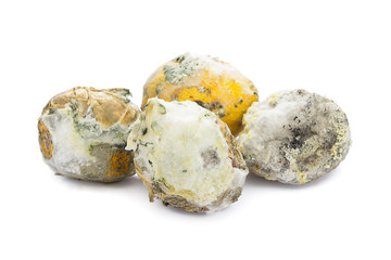 Heap of decayed lemon isolated on white background.    