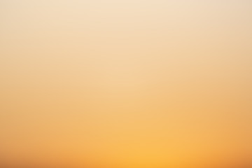 abstract blurred orange color gradient of sunset sky. abstract background, no generate color. natural colors.