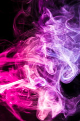 Colored smoke on black background