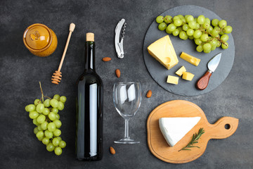 Yellow Maasdam cheese and white Camembert cheese
