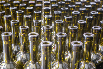 Wine bottles background, winemaking process to preparing wine for bottling in a winery