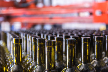 Wine bottles background, winemaking process to preparing wine for bottling in a winery