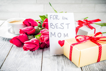 Mother's day greeting background concept, with red rose flowers, greeting card creative pancakes for best mom, i love mom, and coffee mug, wooden background copy space